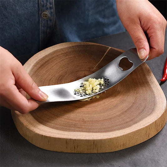 DecorBites™ Garlic Press - Kitchen Gadget for Vegetables and Fruits